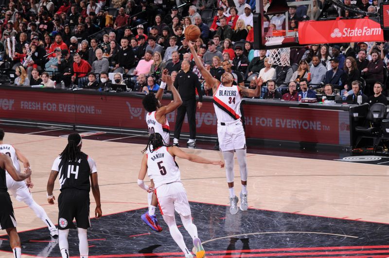 PORTLAND, OR - MARCH 22:  Jabari Walker #34 of the Portland Trail Blazers grabs the rebound during the game on March 22, 2024 at the Moda Center Arena in Portland, Oregon. NOTE TO USER: User expressly acknowledges and agrees that, by downloading and or using this photograph, user is consenting to the terms and conditions of the Getty Images License Agreement. Mandatory Copyright Notice: Copyright 2024 NBAE (Photo by Cameron Browne/NBAE via Getty Images)