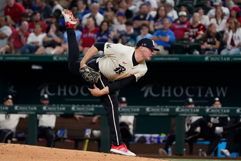 Sep 6, 2024; Arlington, Texas, USA; Texas Rangers pitcher Walter Pennington (52) follows through on a pitch during the fourth inning against the Los Angeles Angels at Globe Life Field. Mandatory Credit: Raymond Carlin III-Imagn Images