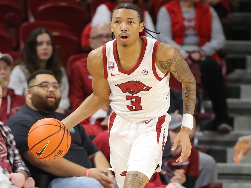 Dec 3, 2022; Fayetteville, Arkansas, USA; Arkansas Razorbacks guard Nick Smith Jr (3) dribble during the first half against the San Jose State Spartans at Bud Walton Arena. Mandatory Credit: Nelson Chenault-USA TODAY Sports