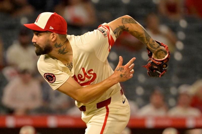 Jun 24, 2024; Anaheim, California, USA;  Los Angeles Angels relief pitcher Hans Crouse (52) delivers to the plate in the ninth inning against the Oakland Athletics at Angel Stadium. Mandatory Credit: Jayne Kamin-Oncea-USA TODAY Sports