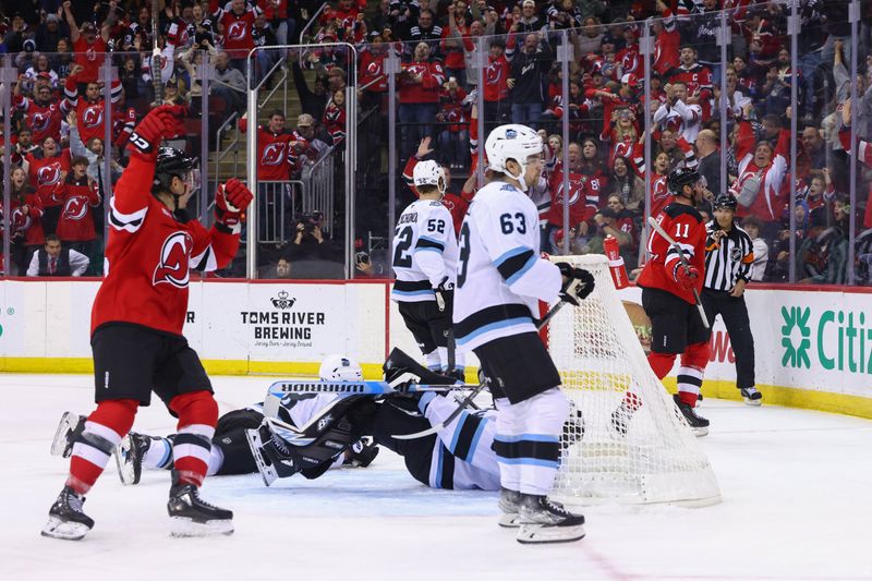 Oct 14, 2024; Newark, New Jersey, USA; New Jersey Devils right wing Stefan Noesen (11) celebrates his goal against the Utah Hockey Club during the second period at Prudential Center. Mandatory Credit: Ed Mulholland-Imagn Images