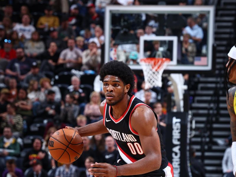 SALT LAKE CITY, UT - OCTOBER 14: Scoot Henderson #00 of the Portland Trail Blazers dribbles the ball during the preseason game on October 14, 2023 at vivint.SmartHome Arena in Salt Lake City, Utah. NOTE TO USER: User expressly acknowledges and agrees that, by downloading and or using this Photograph, User is consenting to the terms and conditions of the Getty Images License Agreement. Mandatory Copyright Notice: Copyright 2023 NBAE (Photo by Melissa Majchrzak/NBAE via Getty Images)