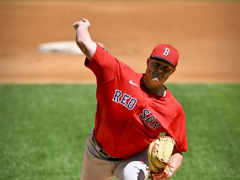 Mar 26, 2024; Arlington, Texas, USA; Boston Red Sox starting pitcher Richard Fitts (80) pitches against the Texas Rangers during the first inning at Globe Life Field. Mandatory Credit: Jerome Miron-USA TODAY Sports