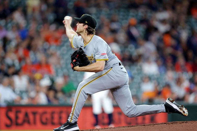 Jul 31, 2024; Houston, Texas, USA; Pittsburgh Pirates starting pitcher Jake Woodford (46) pitches against the Houston Astros during the first inning at Minute Maid Park. Mandatory Credit: Erik Williams-USA TODAY Sports