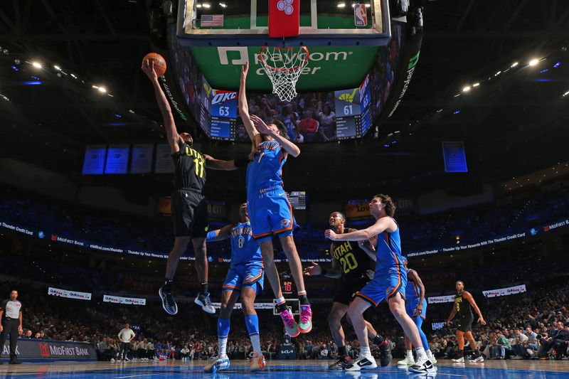 OKLAHOMA CITY, OK - MARCH 20: Kris Dunn #11 of the Utah Jazz shoots the ball during the game against the Oklahoma City Thunder on March 20, 2024 at Paycom Arena in Oklahoma City, Oklahoma. NOTE TO USER: User expressly acknowledges and agrees that, by downloading and or using this photograph, User is consenting to the terms and conditions of the Getty Images License Agreement. Mandatory Copyright Notice: Copyright 2024 NBAE (Photo by Zach Beeker/NBAE via Getty Images)