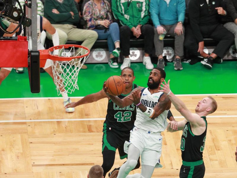 BOSTON, MA - JUNE 9: Kyrie Irving #11 of the Dallas Mavericks goes to the basket during the game against the Boston Celtics during Game 2 of the 2024 NBA Finals on June 9, 2024 at the TD Garden in Boston, Massachusetts. NOTE TO USER: User expressly acknowledges and agrees that, by downloading and or using this photograph, User is consenting to the terms and conditions of the Getty Images License Agreement. Mandatory Copyright Notice: Copyright 2024 NBAE  (Photo by Chris Marion/NBAE via Getty Images)