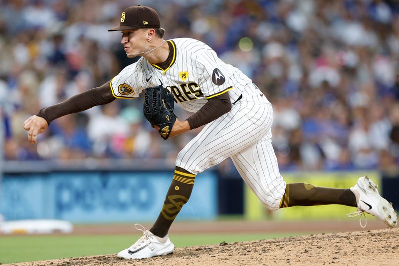 Jul 31, 2024; San Diego, California, USA; San Diego Padres relief pitcher Alek Jacob (37) pitches during the seventh inning against the Los Angeles Dodgers at Petco Park. Mandatory Credit: David Frerker-USA TODAY Sports