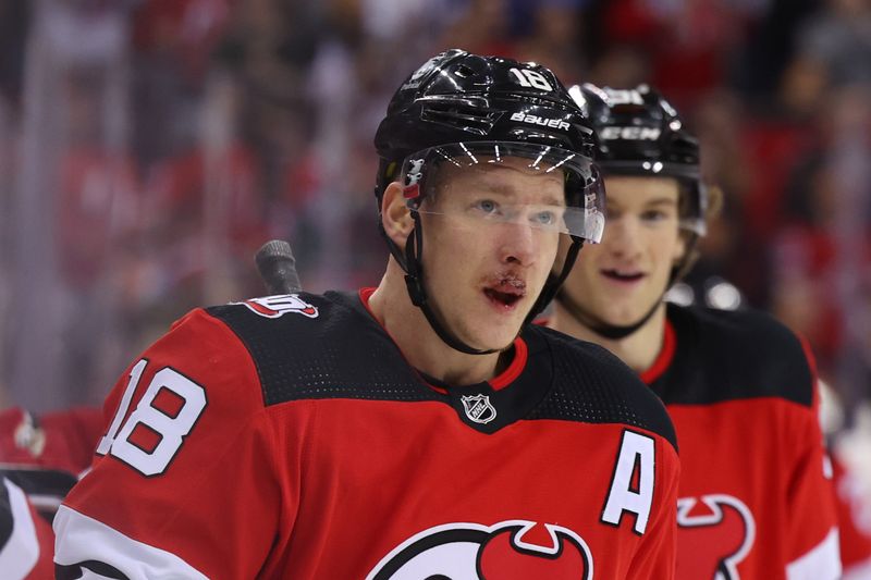 Mar 7, 2023; Newark, New Jersey, USA; New Jersey Devils left wing Ondrej Palat (18) celebrates his goal against the Toronto Maple Leafs during the third period at Prudential Center. Mandatory Credit: Ed Mulholland-USA TODAY Sports