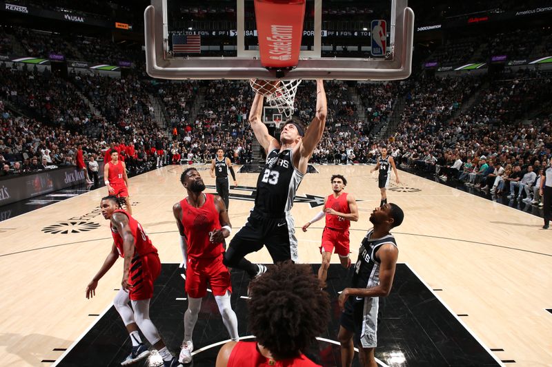 SAN ANTONIO, TX - JANUARY 26: Zach Collins #23 of the San Antonio Spurs dunks the ball during the game against the Portland Trail Blazers on January 6, 2024 at the Frost Bank Center in San Antonio, Texas. NOTE TO USER: User expressly acknowledges and agrees that, by downloading and or using this photograph, user is consenting to the terms and conditions of the Getty Images License Agreement. Mandatory Copyright Notice: Copyright 2024 NBAE (Photos by David Sherman/NBAE via Getty Images)