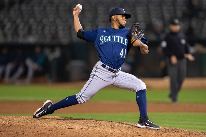 Sep 19, 2023; Oakland, California, USA; Seattle Mariners relief pitcher Eduard Bazardo (41) delivers a pitch against the Oakland Athletics during the ninth inning at Oakland-Alameda County Coliseum. Mandatory Credit: Neville E. Guard-USA TODAY Sports