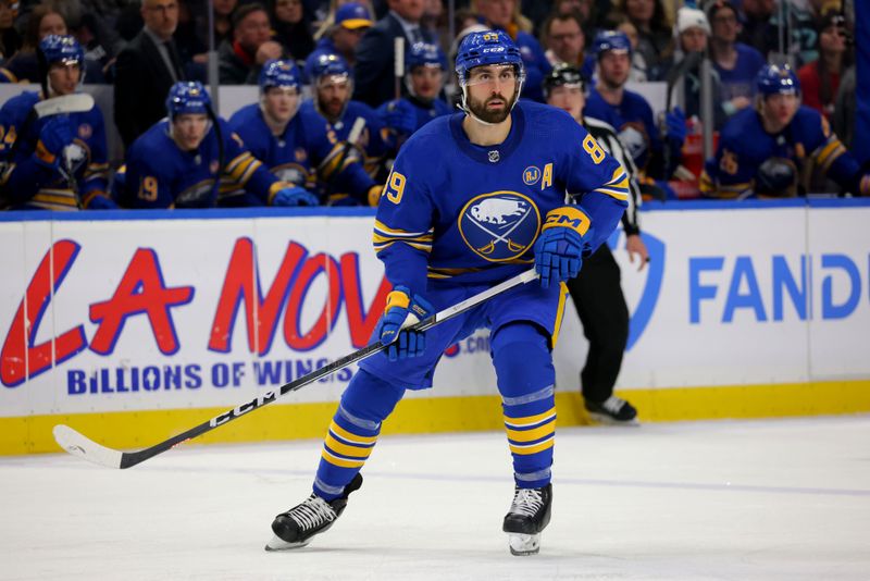 Jan 9, 2024; Buffalo, New York, USA;  Buffalo Sabres right wing Alex Tuch (89) looks for the puck during the second period against the Seattle Kraken at KeyBank Center. Mandatory Credit: Timothy T. Ludwig-USA TODAY Sports