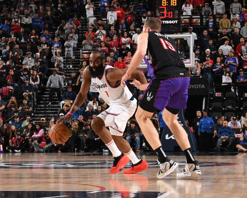 INGLEWOOD, CA - NOVEMBER 9: James Harden #1 of the LA Clippers dribbles the ball during the game against the Toronto Raptors on November 9, 2024 at Intuit Dome in Los Angeles, California. NOTE TO USER: User expressly acknowledges and agrees that, by downloading and/or using this Photograph, user is consenting to the terms and conditions of the Getty Images License Agreement. Mandatory Copyright Notice: Copyright 2024 NBAE (Photo by Noah Graham/NBAE via Getty Images)