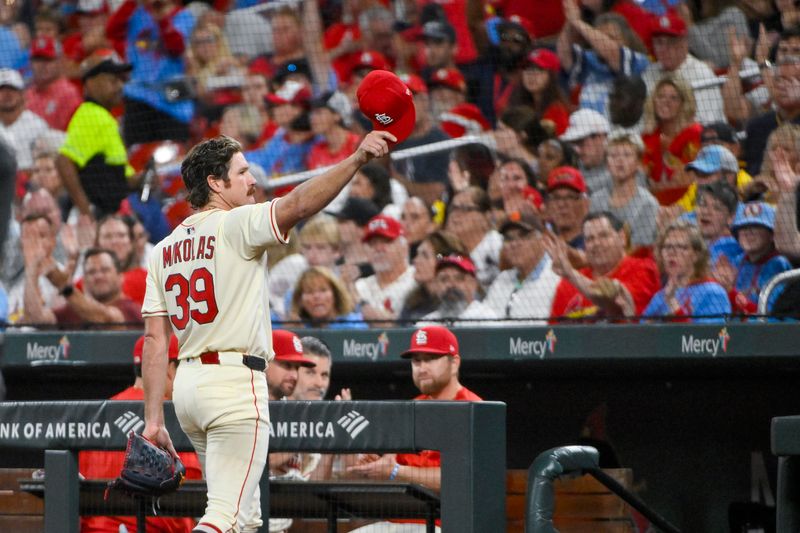 Sep 20, 2025; St. Louis, Missouri, USA; St. Louis Cardinals starting pitcher Miles Mikolas (39) salutes the fans after he was removed from the game during the sixth inning against the Milwaukee Brewers at Busch Stadium. Mandatory Credit: Jeff Curry-Imagn Images