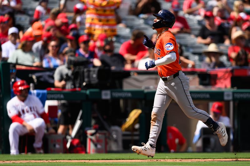 Sep 28, 2025; Anaheim, California, USA; Houston Astros third baseman Ramon Urias (29) gestures after hitting a home run during the fifth inning against the Los Angeles Angels at Angel Stadium. Mandatory Credit: William Liang-Imagn Images