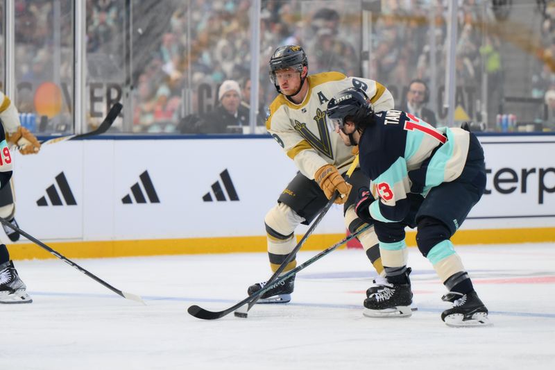 Jan 1, 2024; Seattle, Washington, USA; Vegas Golden Knights center Jack Eichel (9) passes the puck past Seattle Kraken left wing Brandon Tanev (13) during the game in the 2024 Winter Classic ice hockey game at T-Mobile Park. Mandatory Credit: Steven Bisig-USA TODAY Sports