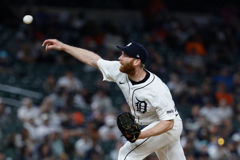 May 12, 2025; Detroit, Michigan, USA;  Detroit Tigers pitcher John Brebbia (49) pitches eighth inning against the Boston Red Sox at Comerica Park. Mandatory Credit: Rick Osentoski-Imagn Images