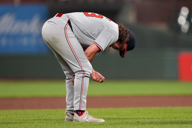 Apr 9, 2024; San Francisco, California, USA; Washington Nationals pitcher Hunter Harvey (73) kneels over on the field after being hit by a batted ball during the eighth inning against the San Francisco Giants at Oracle Park. Mandatory Credit: Darren Yamashita-USA TODAY Sports