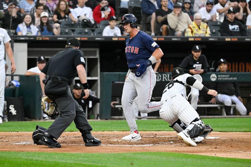 Jun 7, 2024; Chicago, Illinois, USA;  Boston Red Sox first base Bobby Dalbec (29) scores against the Chicago White Sox during the third inning at Guaranteed Rate Field. Mandatory Credit: Matt Marton-USA TODAY Sports