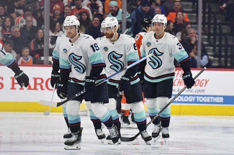 Feb 10, 2024; Philadelphia, Pennsylvania, USA; Seattle Kraken left wing Jared McCann (19) skates back the bench after scoring a goal against the Philadelphia Flyers during the third period at Wells Fargo Center. Mandatory Credit: Eric Hartline-USA TODAY Sports