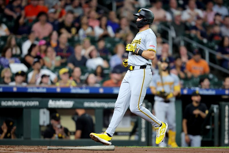Jul 31, 2024; Houston, Texas, USA; Pittsburgh Pirates second baseman Jared Triolo (19) scores a run against the Houston Astros during the second inning at Minute Maid Park. Mandatory Credit: Erik Williams-USA TODAY Sports