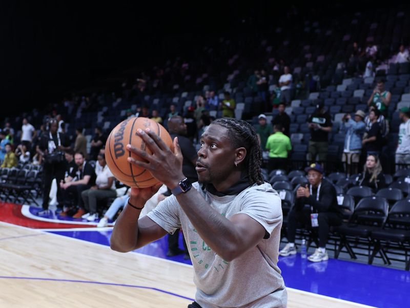 ABU DHABI, UAE - OCTOBER 6: Jrue Holiday #4 of the Boston Celtics warms up before the game against the Denver Nuggets during the 2024 Global Games on October 6, 2024 at the Etihad Arena in Abu Dhabi, United Arab Emirates. NOTE TO USER: User expressly acknowledges and agrees that, by downloading and/or using this Photograph, user is consenting to the terms and conditions of the Getty Images License Agreement. Mandatory Copyright Notice: Copyright 2024 NBAE (Photo by Brian Choi/NBAE via Getty Images)