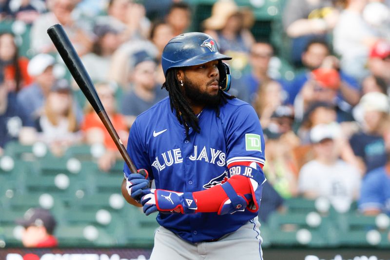 May 24, 2024; Detroit, Michigan, USA; Toronto Blue Jays first baseman Vladimir Guerrero Jr. (27) looks on during an at bat in the first inning of the game against the Detroit Tigers at Comerica Park. Mandatory Credit: Brian Bradshaw Sevald-USA TODAY Sports