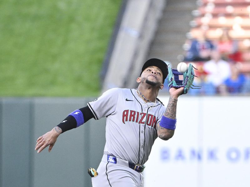 Apr 22, 2024; St. Louis, Missouri, USA;  Arizona Diamondbacks second baseman Ketel Marte (4) catches a fly ball against the St. Louis Cardinals during the first inning at Busch Stadium. Mandatory Credit: Jeff Curry-USA TODAY Sports