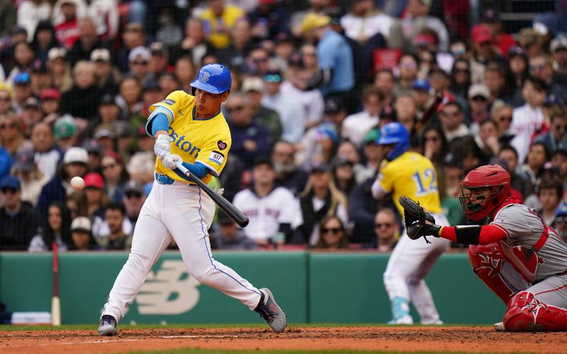 Apr 14, 2024; Boston, Massachusetts, USA; Boston Red Sox left fielder Masataka Yoshida (7) hits a two run home run against the Los Angeles Angels in the sixth inning at Fenway Park. Mandatory Credit: David Butler II-USA TODAY Sports