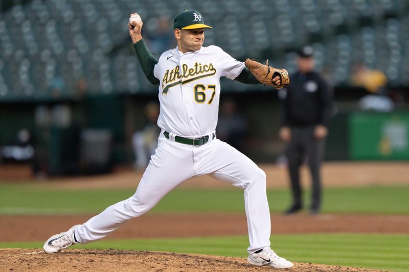 May 16, 2023; Oakland, California, USA; Oakland Athletics relief pitcher Garrett Acton (67) pitches during the fifth inning against the Arizona Diamondbacks at Oakland-Alameda County Coliseum. Mandatory Credit: Stan Szeto-USA TODAY Sports