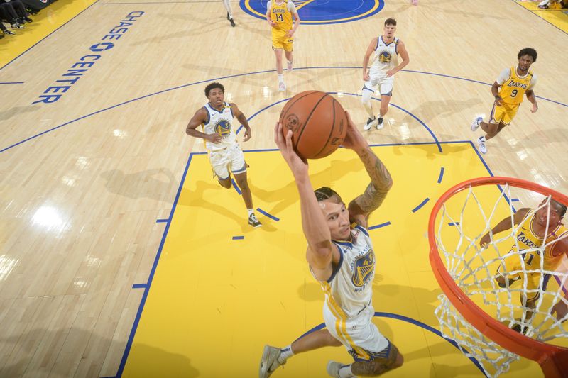 SAN FRANCISCO, CA - OCTOBER 18: Lindy Waters III #43 of the Golden State Warriors drives to the basket during the game against the Los Angeles Lakers during a NBA Preseason game on October 18, 2024 at Chase Center in San Francisco, California. NOTE TO USER: User expressly acknowledges and agrees that, by downloading and or using this photograph, user is consenting to the terms and conditions of Getty Images License Agreement. Mandatory Copyright Notice: Copyright 2024 NBAE (Photo by Noah Graham/NBAE via Getty Images)