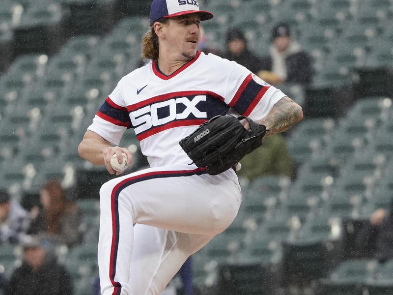 Apr 30, 2023; Chicago, Illinois, USA; Chicago White Sox starting pitcher Mike Clevinger (52) throws a pitch against the Tampa Bay Rays during the first inning at Guaranteed Rate Field. Mandatory Credit: David Banks-USA TODAY Sports