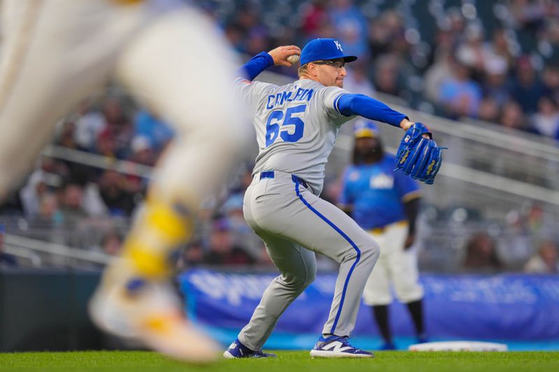 May 23, 2025; Minneapolis, Minnesota, USA; Kansas City Royals pitcher Noah Cameron (65) throws to first base against the Minnesota Twins in the sixth inning at Target Field. Mandatory Credit: Brad Rempel-Imagn Images