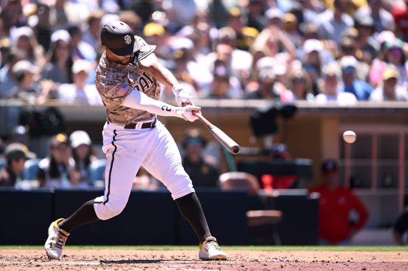 Jun 25, 2023; San Diego, California, USA; San Diego Padres shortstop Xander Bogaerts (2) hits a single against the Washington Nationals during the fourth inning at Petco Park. Mandatory Credit: Orlando Ramirez-USA TODAY Sports