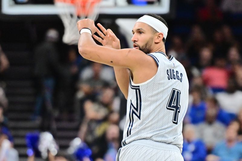 ORLANDO, FLORIDA - NOVEMBER 27: Jalen Suggs #4 of the Orlando Magic reacts after scoring a three-point-basket in the first half of a game against the Chicago Bulls at Kia Center on November 27, 2024 in Orlando, Florida. NOTE TO USER: User expressly acknowledges and agrees that, by downloading and or using this photograph, User is consenting to the terms and conditions of the Getty Images License Agreement. (Photo by Julio Aguilar/Getty Images)