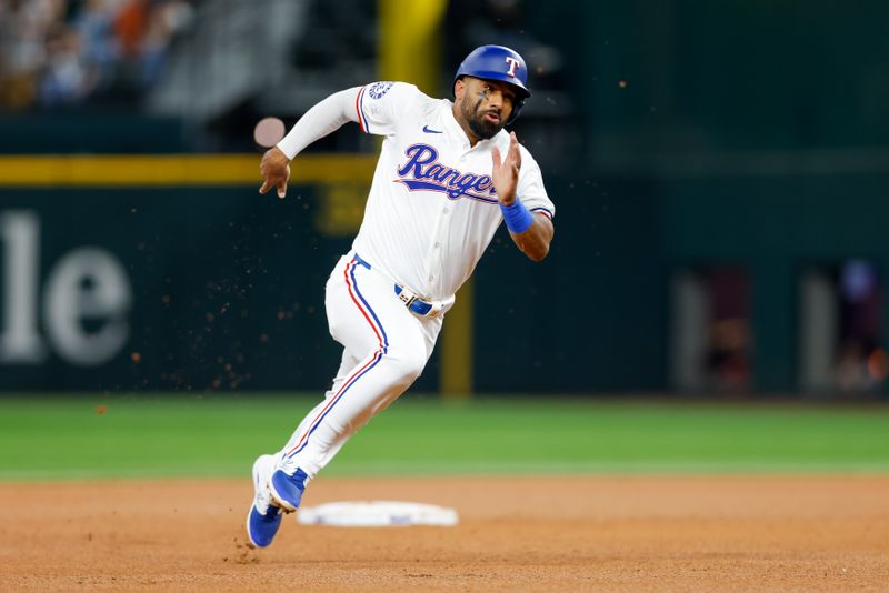 Sep 4, 2024; Arlington, Texas, USA; Texas Rangers third base Ezequiel Duran (20) rounds second base during the fourth inning against the New York Yankees at Globe Life Field. Mandatory Credit: Andrew Dieb-Imagn Images