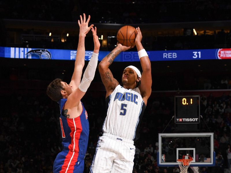 DETROIT, MI - FEBRUARY 4: Paolo Banchero #5 of the Orlando Magic shoots the ball during the game  against the Detroit Pistons on February 4, 2024 at Little Caesars Arena in Detroit, Michigan. NOTE TO USER: User expressly acknowledges and agrees that, by downloading and/or using this photograph, User is consenting to the terms and conditions of the Getty Images License Agreement. Mandatory Copyright Notice: Copyright 2024 NBAE (Photo by Chris Schwegler/NBAE via Getty Images)