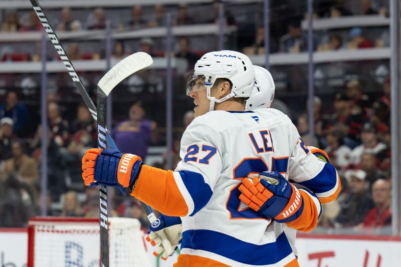 Nov 7, 2024; Ottawa, Ontario, CAN; New York Islanders left wing Anders Lee (27) celebrates his goal scored in the second period against the Ottawa Senators at the Canadian Tire Centre. Mandatory Credit: Marc DesRosiers-Imagn Images