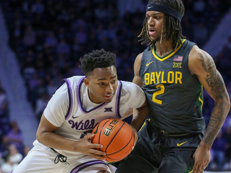 Jan 16, 2024; Manhattan, Kansas, USA; Kansas State Wildcats guard Tylor Perry (2) drives to the basket against Baylor Bears guard Jayden Nunn (2) during the first half at Bramlage Coliseum. Mandatory Credit: Scott Sewell-USA TODAY Sports