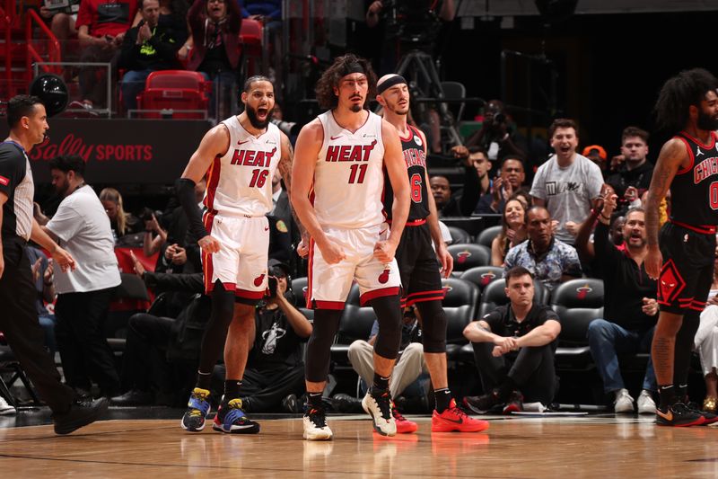 MIAMI, FL - APRIL 19: Jaime Jaquez Jr. #11 of the Miami Heat celebrates during the game against the Chicago Bulls during the 2024 Play-In Tournament on April 19, 2024 at Kaseya Center in Miami, Florida. NOTE TO USER: User expressly acknowledges and agrees that, by downloading and or using this Photograph, user is consenting to the terms and conditions of the Getty Images License Agreement. Mandatory Copyright Notice: Copyright 2024 NBAE (Photo by Issac Baldizon/NBAE via Getty Images)