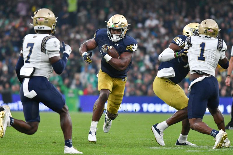 Aug 26, 2023; Dublin, IRL; Notre Dame Fighting Irish running back Audric Estime (7) runs the ball in the first quarter against the Navy Midshipmen at Aviva Stadium. Mandatory Credit: Matt Cashore-USA TODAY Sports