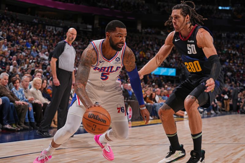 DENVER, CO - JANUARY 27: Marcus Morris Sr. #5 of the Philadelphia 76ers handles the ball during the game against the Denver Nuggets on January 27, 2024 at the Ball Arena in Denver, Colorado. NOTE TO USER: User expressly acknowledges and agrees that, by downloading and/or using this Photograph, user is consenting to the terms and conditions of the Getty Images License Agreement. Mandatory Copyright Notice: Copyright 2024 NBAE (Photo by Bart Young/NBAE via Getty Images)