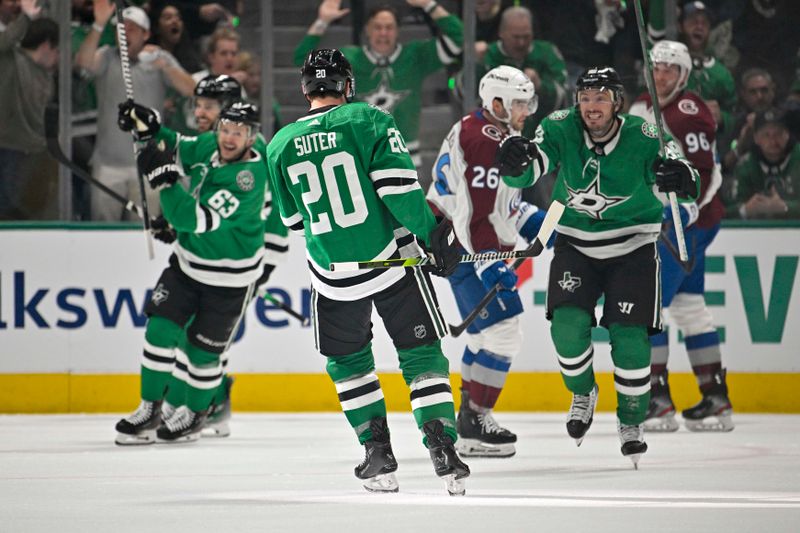 May 7, 2024; Dallas, Texas, USA; Dallas Stars right wing Evgenii Dadonov (63) and defenseman Ryan Suter (20) and center Matt Duchene (95) celebrates a goal scored by Suter against the Colorado Avalanche during the first period in game one of the second round of the 2024 Stanley Cup Playoffs at American Airlines Center. Mandatory Credit: Jerome Miron-USA TODAY Sports