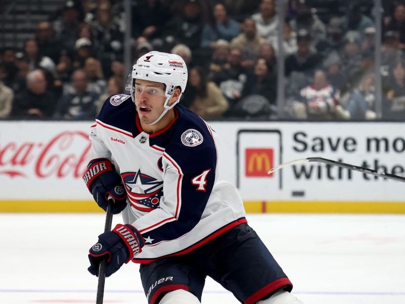 Nov 9, 2024; Los Angeles, California, USA; Columbus Blue Jackets center Cole Sillinger (4) skates with the puck during the third period against the Los Angeles Kings at Crypto.com Arena. Mandatory Credit: Jason Parkhurst-Imagn Images