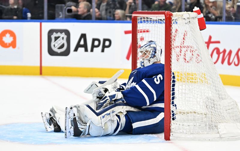 Feb 7, 2024; Toronto, Ontario, CAN; Toronto Maple Leafs goalie Ilya Samsonov (35) sits in his goalmouth after giving up a goal to Dallas Stars forward Jamie Benn (not shown) in the first period at Scotiabank Arena. Mandatory Credit: Dan Hamilton-USA TODAY Sports