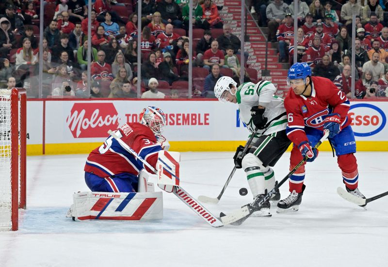 Feb 10, 2024; Montreal, Quebec, CAN; Montreal Canadiens goalie Sam Montembeault (35) and defenseman Johnathan Kovacevic (26) stop Dallas Stars defenseman Thomas Harley (55) during the third period at the Bell Centre. Mandatory Credit: Eric Bolte-USA TODAY Sports