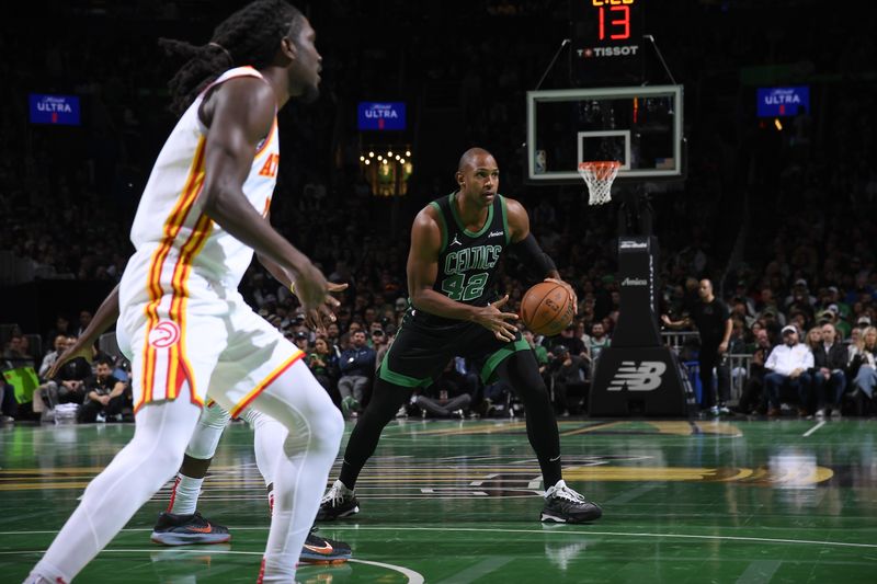BOSTON, MA - NOVEMBER 12: Al Horford #42 of the Boston Celtics handles the ball during the game against the Atlanta Hawks during the Emirates NBA Cup game on November 12, 2024 at TD Garden in Boston, Massachusetts. NOTE TO USER: User expressly acknowledges and agrees that, by downloading and/or using this Photograph, user is consenting to the terms and conditions of the Getty Images License Agreement. Mandatory Copyright Notice: Copyright 2024 NBAE (Photo by Brian Babineau/NBAE via Getty Images)