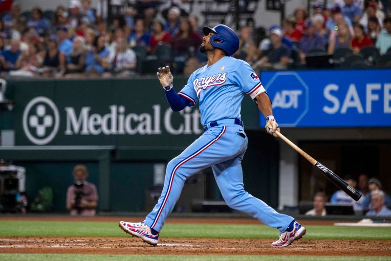 Sep 3, 2023; Arlington, Texas, USA; Texas Rangers second baseman Marcus Semien (2) hits a single against the Minnesota Twins during the fourth inning at Globe Life Field. Mandatory Credit: Jerome Miron-USA TODAY Sports