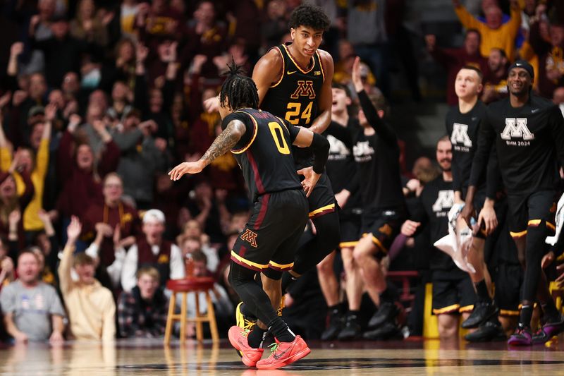 Feb 6, 2024; Minneapolis, Minnesota, USA; Minnesota Golden Gophers guard Cam Christie (24) celebrates his three-point basket against Michigan State during the second half at Williams Arena. Mandatory Credit: Matt Krohn-USA TODAY Sports