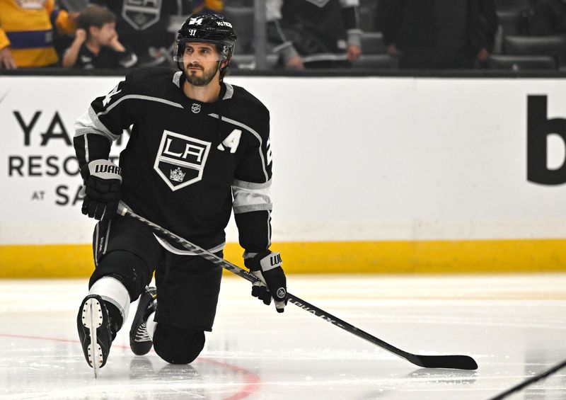 Oct 13, 2022; Los Angeles, California, USA;  Los Angeles Kings center Phillip Danault (24) warms up prior to the game against the Seattle Kraken at Crypto.com Arena. Mandatory Credit: Jayne Kamin-Oncea-USA TODAY Sports