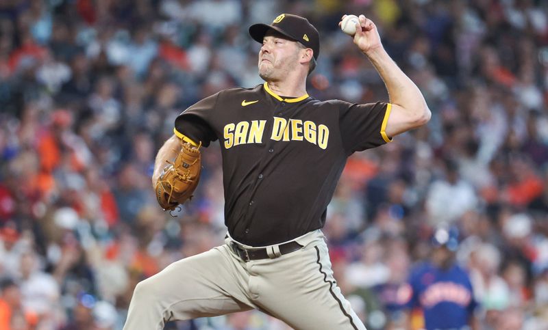 Sep 10, 2023; Houston, Texas, USA; San Diego Padres starting pitcher Rich Hill (41) delivers a pitch during the eighth inning against the Houston Astros at Minute Maid Park. Mandatory Credit: Troy Taormina-USA TODAY Sports